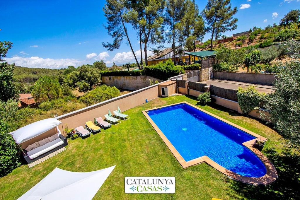 Can Vinyals Villa | Catalunya Casas Modern and spacious with private pool close to BCN