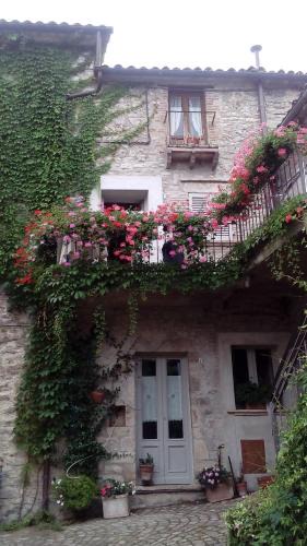 Collelungo House | la Casa sull'arco - Albergo diffuso Collelungo