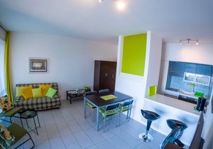 Attractive 2-room apartment with sunbath, pool and dream view