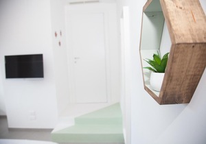 Green apartment with double bedroom and living room / kitchen with sofa bed and private bathroom