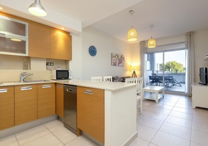 Ground floor with private terrace, pool and parking