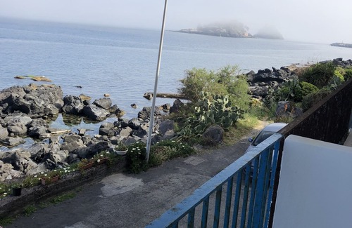 Aci Castello Apartment | Charming sea-front Bivani Aci Trezza two meters from the sea, on the cliff.