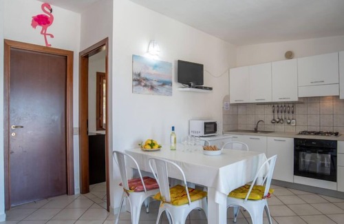 Costa Corallina House | Flamingo by Interhome