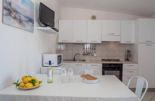 Costa Corallina House | Flamingo by Interhome