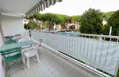 Porto Santa Margherita Apartment | Welcoming flat with pool view balcony