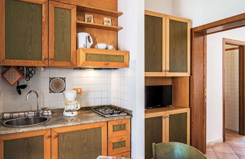 San Feliciano Apartment | Lovely apartment for 4 guests with pool, A/C, WIFI, TV, patio and pets allowed