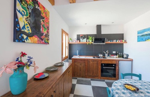 Burano House | Pink artist's house on the edge of the lagoon, overlooking Torcello and the Alps.