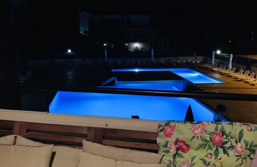 Capo Mulini Apartment | The pool terrace - Baia di Capomulini