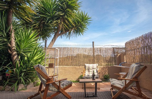 Olbia Apartment | A beautiful nest, an elegant design, attention to detail, and a wonderful yard.