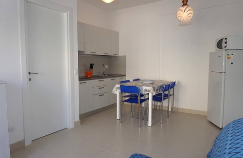 Porto Santa Margherita Apartment | Apartment with private garden