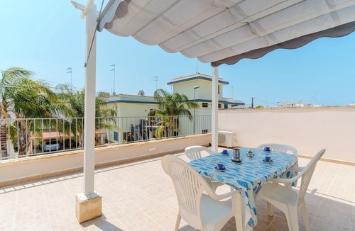 Santa Maria al Bagno Apartment | Apartment 'Bouganvillea' with Sea View, Shared Terrace and Air Conditioning