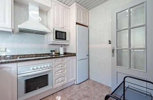 Comarruga Apartment | Apartment 'Near Beaches Large Private Patio' with Shared Pool, Wi-Fi and Air Conditioning