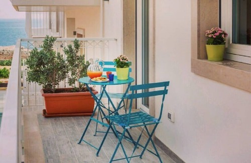 Polignano a Mare House | Bright Dwelling with sea view, partnered with private beach and pool/spa.