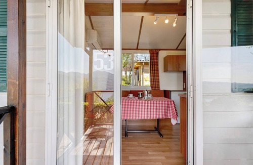 Pratolungo RV Rental | Caravan 'Mobile Home Comfort Vista Lago' with Lake View, Shared Pool and Private Garden