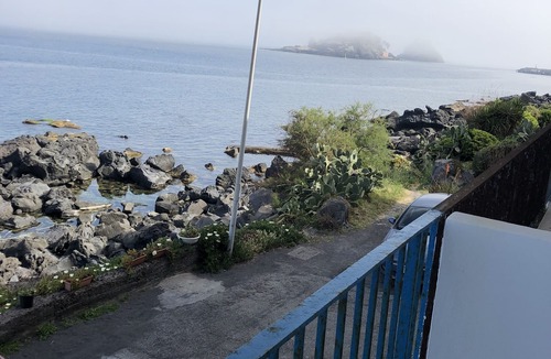 Aci Castello Apartment | Charming sea-front Bivani Aci Trezza two meters from the sea, on the cliff.