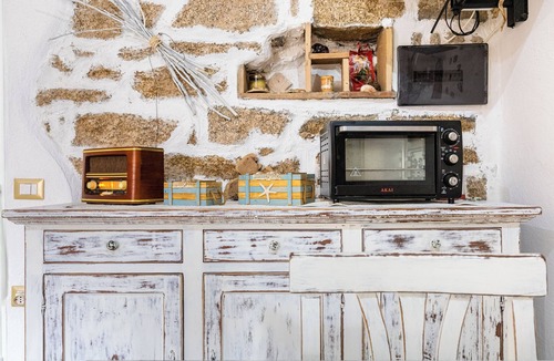 San Pantaleo Apartment | Charming Vacation Home “Tipica casa a San Pantaleo“ in Central Location with Balcony