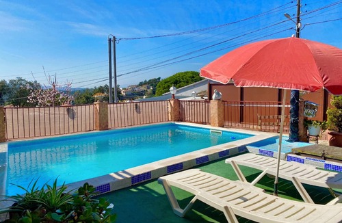 Vidreres Villa | Club Villamar - Charming Spanish-style villa with a private pool, terraces, and functional interi.