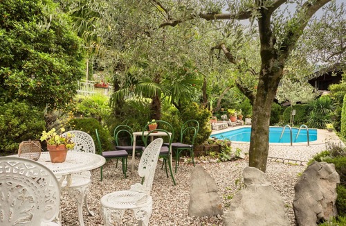 Vito d'Asio Apartment | Cosy apartment for 4 guests with pool, WIFI, A/C, TV, patio and pets allowed