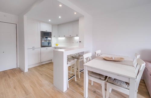 Palafolls Apartment | Cozy duplex for 4 people, free wifi and air conditioning next to the bedrooms. Vivalidays Elisabet community pool and garden