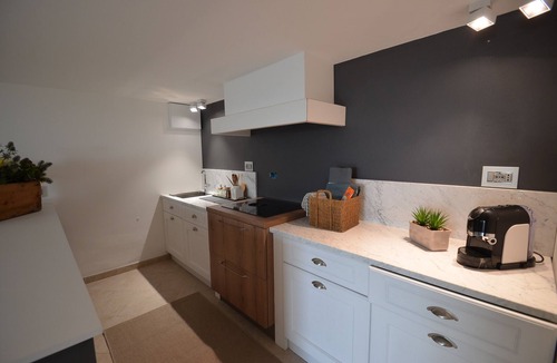 Monade Santa Lucia Apartment | Designer apartment with garden and private pool in a panoramic location