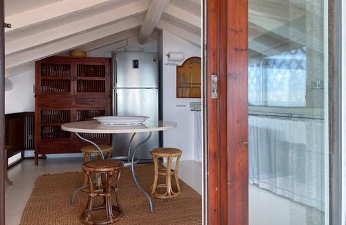 Porto Rotondo Apartment | Designer apartment overlooking the bay. Shared pool, access to the sea