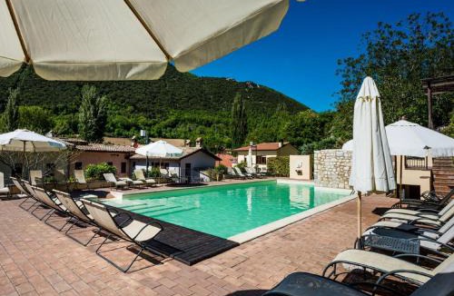 Foligno House | Elegant apartment in resort with swimming pool featuring nature and tranquillity