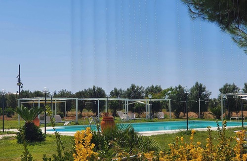 Lizzano House | Homerez - Charming Bungalow in Lizzano with Shared Pool