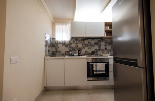 Sasso Barisano Apartment | La finestra sul campanile - Rosaria
