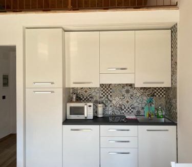 Cuneo Apartment | La scala dei sogni
