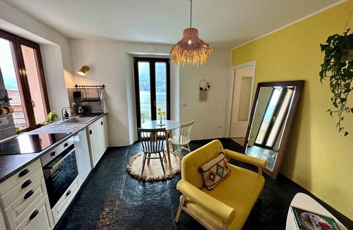Pognana Lario Apartment | Light and spacious apartment with full lake view, private terrace and large garden access.