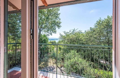 San Feliciano Apartment | Lovely apartment for 4 guests with pool, A/C, WIFI, TV, patio and pets allowed