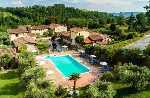 Ramazzano Villa | Mansion in Perugia with Pool & Green Hills