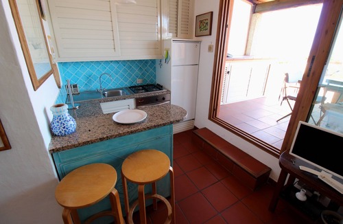 Golfo di Marinella Apartment | Marineled apartment 50 meters from the beach, swimming pool, restaurant bar, wifi