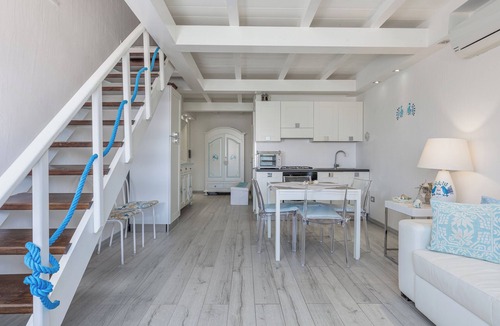 Porto Rotondo Apartment | Modern Apartment Giglio with Sea View, Mountain View, Wi-Fi & Terraces