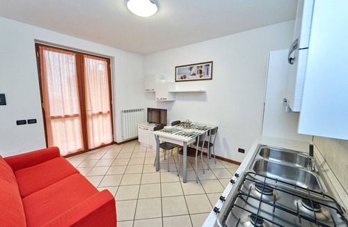 Curno Apartment | Modern one-bedroom apartment near the hospital, with large garden and equipped with washing machine