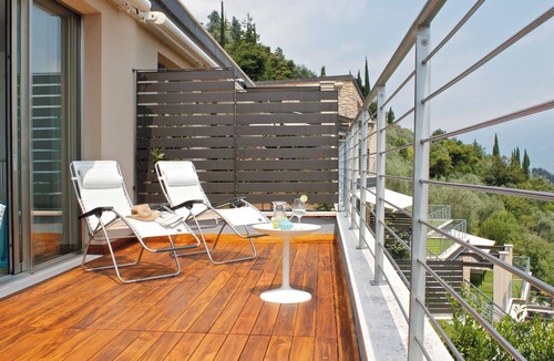 Toscolano Maderno Apartment | Modern style apartment limonaia, with magnificent views of the lake and a large swimming pool