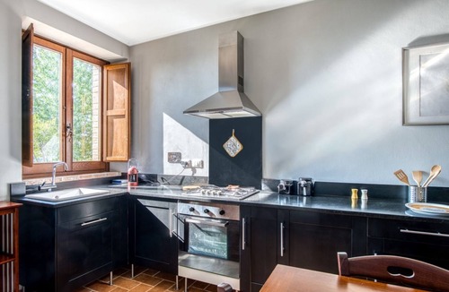 Fratticiola Selvatica Apartment | Nature's Haven Olivi Apartment in Renovated Farmhouse with Pool