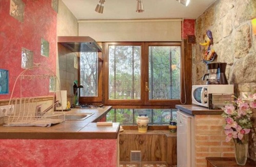 Galapagar Cottage | Peñalara-la casa de Galapagar, romantic stone lodging with fireplace.