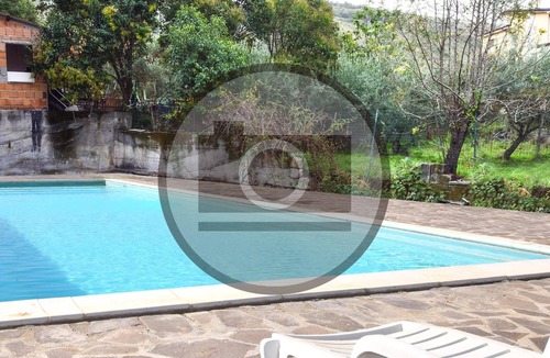 Praia a Mare Apartment | Practical apartment with open terrace and communal pool.