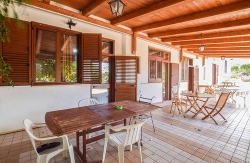 Praia a Mare Apartment | Practical apartment with open terrace and communal pool.