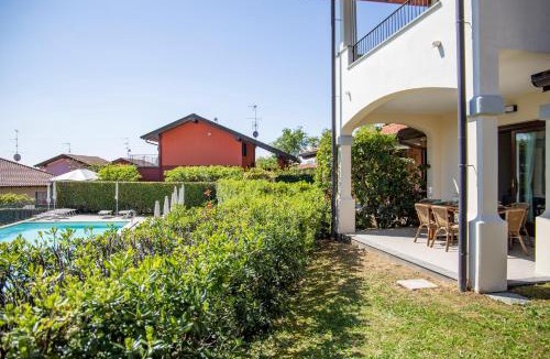 Massino Visconti Apartment | Residenza La Corte Visconti - Deluxe flat with pool and patio