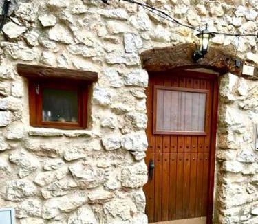 El Pinell de Brai House | Rural Stone House with wood fireplace