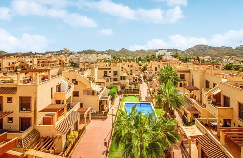Los Geraeos Apartment | Spacious and practical vacation apartment in a gated community with communal pools.