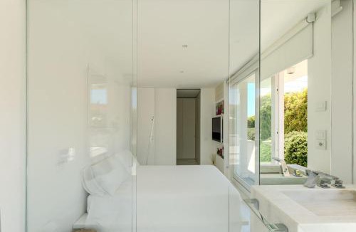 Marzocca Villa | Villa Rosa del mare - Elegante villa fronte mare con Jacuzzi e giardino privato