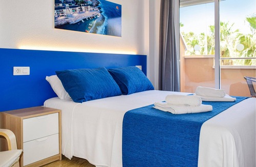 Los Puertos Apartment | Welcome to this lovely vacation apartment, just a few steps from the beach.