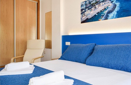 Los Puertos Apartment | Welcome to this lovely vacation apartment, just a few steps from the beach.