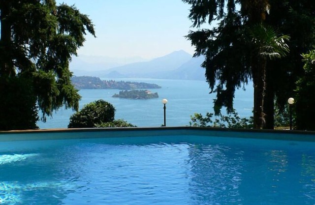 1-room apartment with balcony in an Art Nouveau villa with communal pool