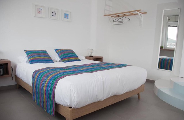 Azzurro apartment with double bedroom and living room / kitchen with sofa bed and private bathroom