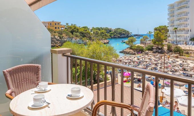 Cala Ferrera Apartment | Apartment Playa Marina with Sea View, Balcony, Shared Pool & Wi-Fi