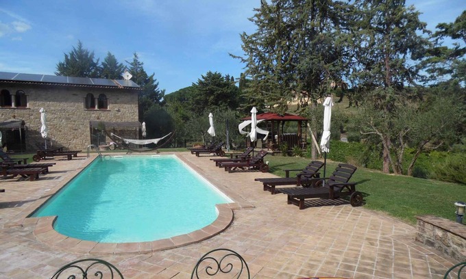 Ramazzano Apartment | Holiday apartment with pool, garden and air conditioning